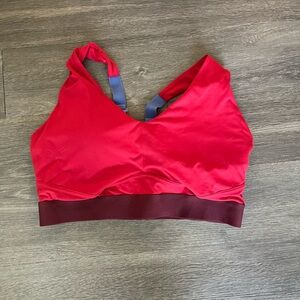 Red and Burgundy Fabletics sports bra